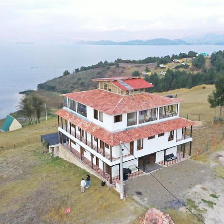 Hotel Tota Eliseo Playa Blanca Lago De 토타 외부 사진