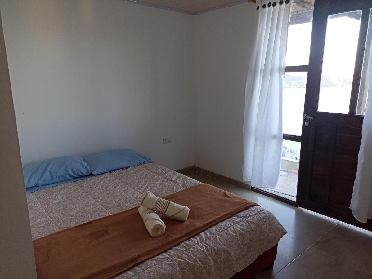 Hotel Tota Eliseo Playa Blanca Lago De 토타 외부 사진