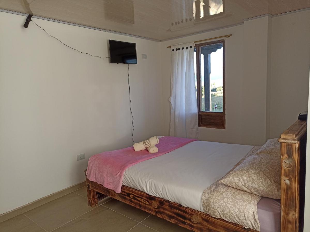 Hotel Tota Eliseo Playa Blanca Lago De 토타 외부 사진