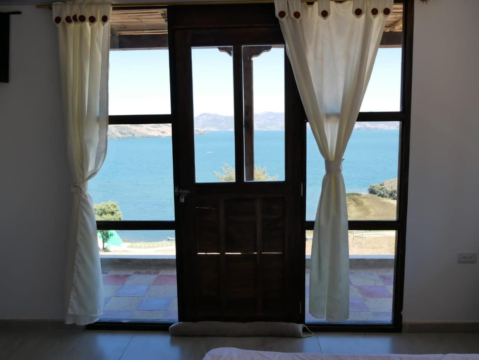 Hotel Tota Eliseo Playa Blanca Lago De 토타 외부 사진