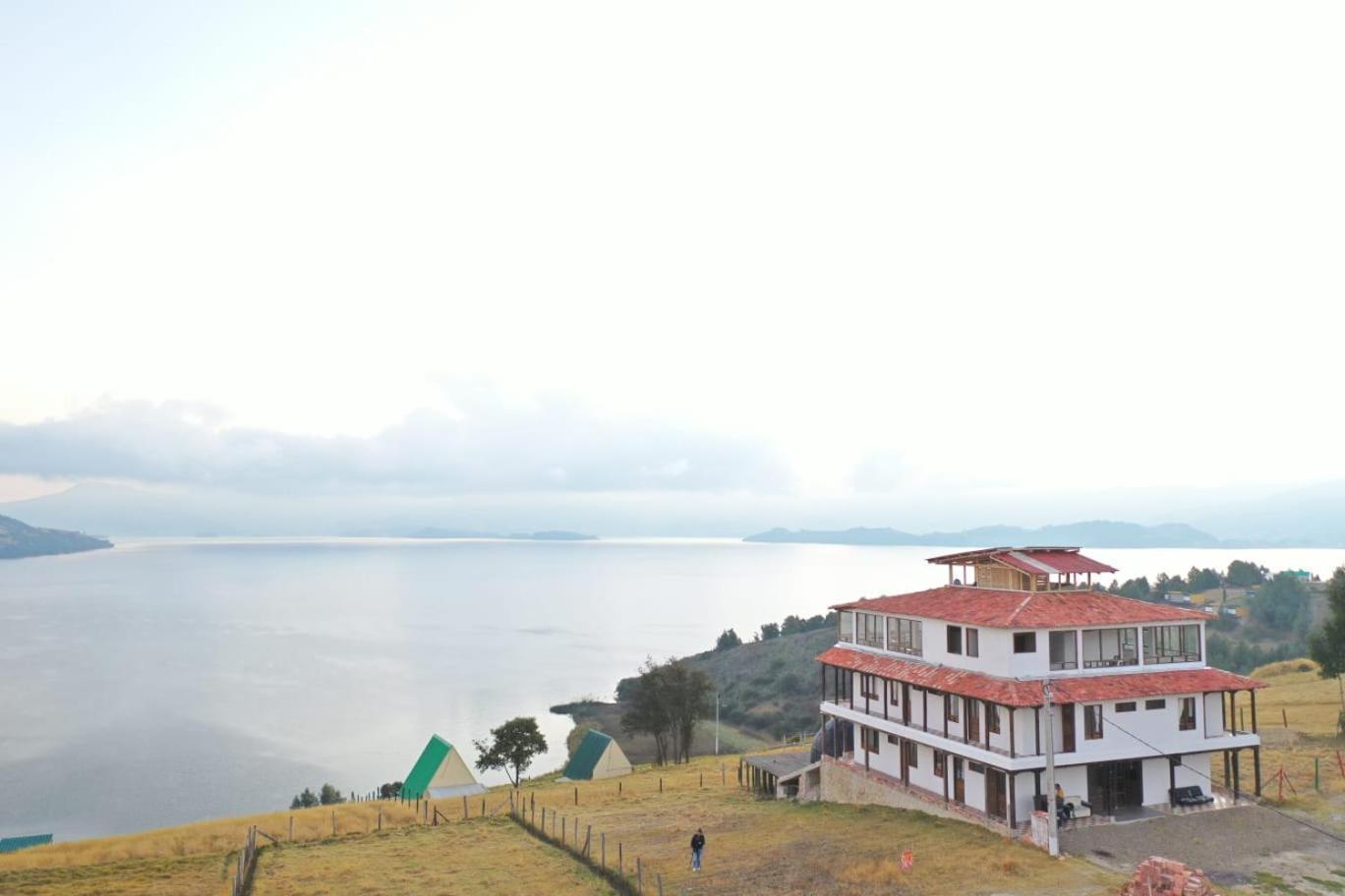 Hotel Tota Eliseo Playa Blanca Lago De 토타 외부 사진
