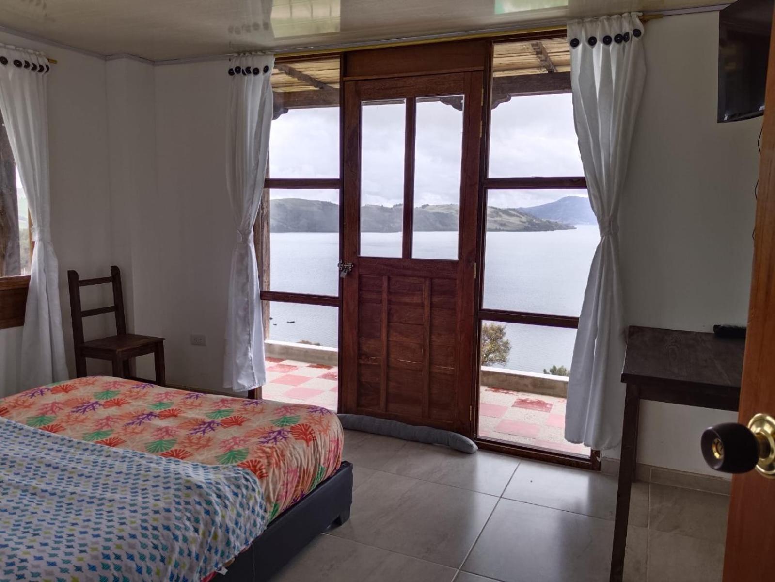 Hotel Tota Eliseo Playa Blanca Lago De 토타 외부 사진