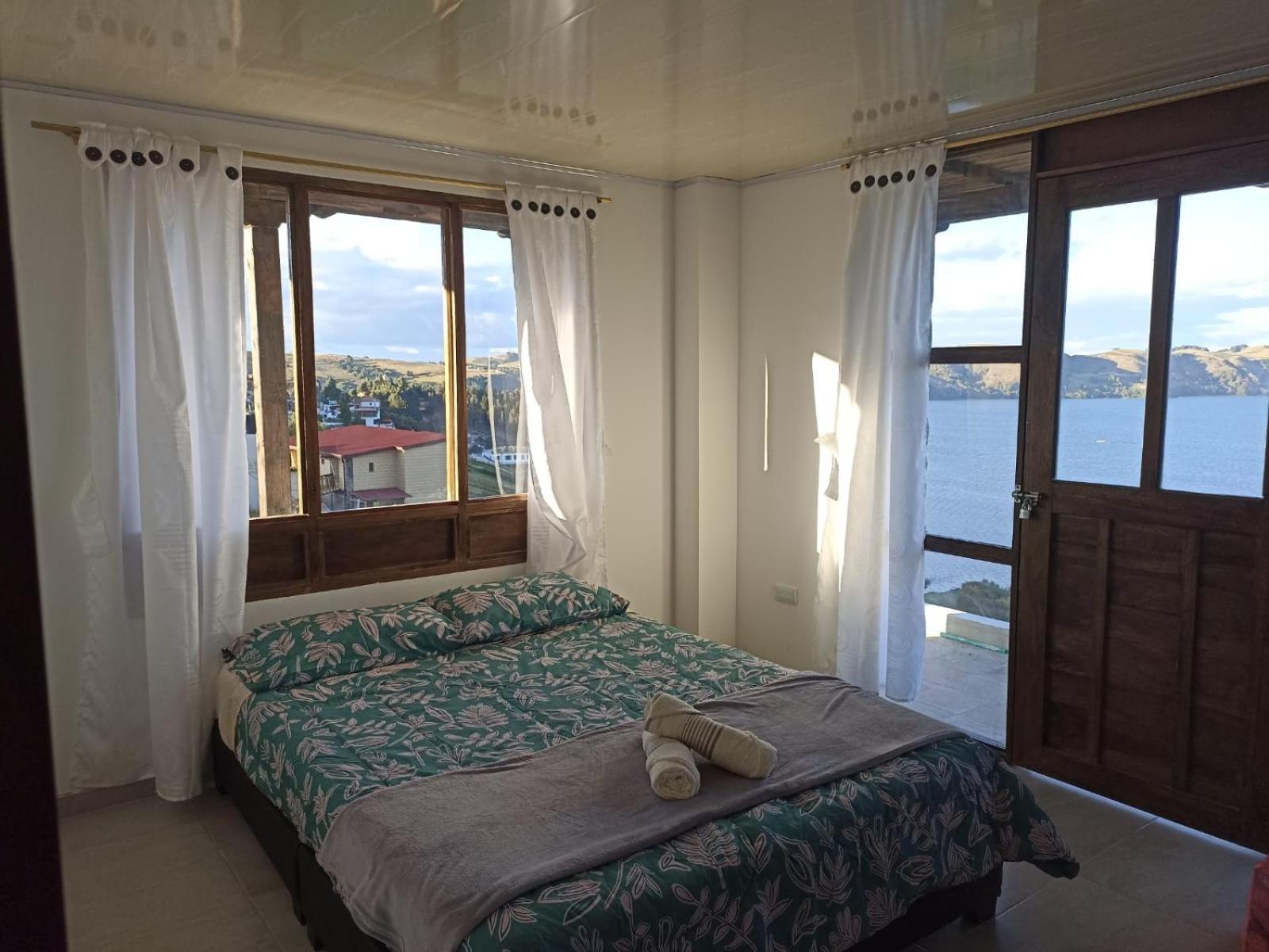 Hotel Tota Eliseo Playa Blanca Lago De 토타 외부 사진