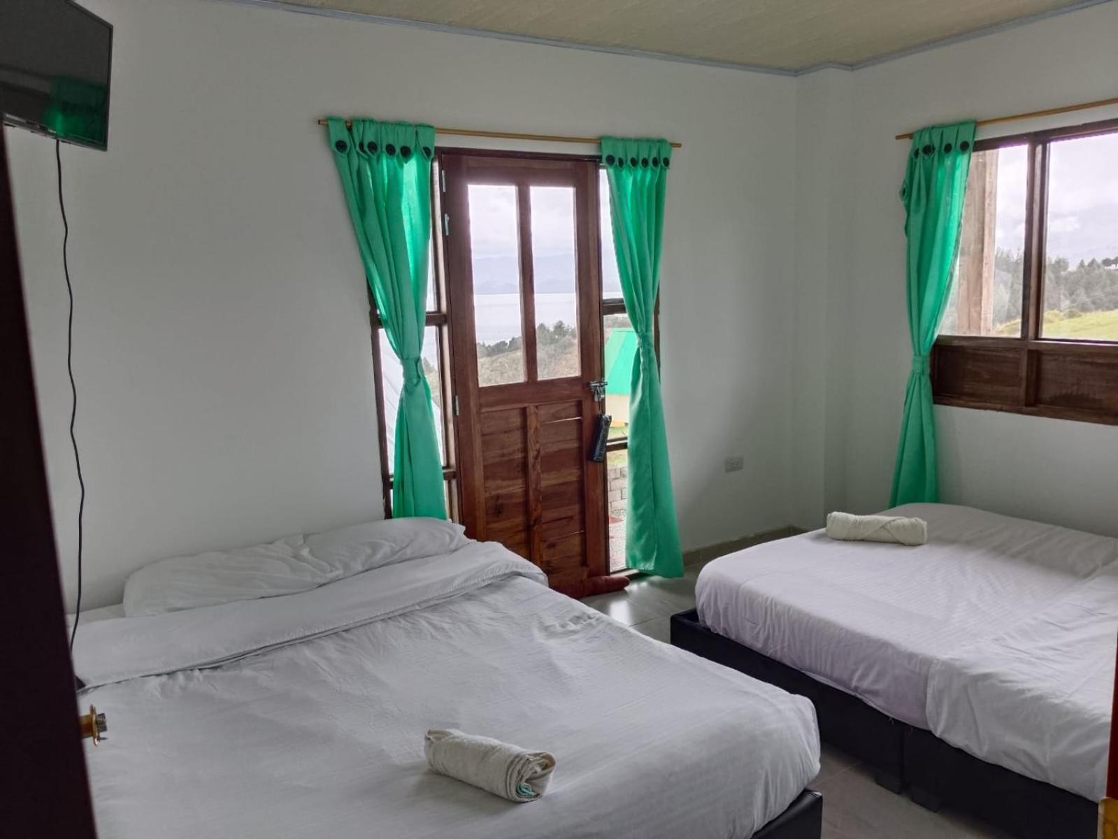 Hotel Tota Eliseo Playa Blanca Lago De 토타 외부 사진